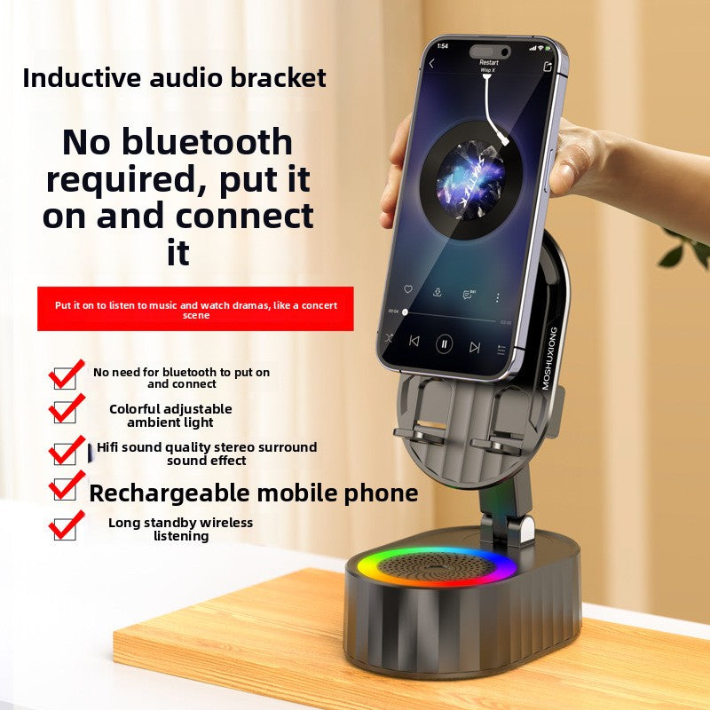 Sensor phone stand speaker
